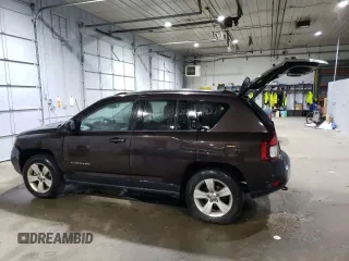 2014 Jeep Compass Latitude with VIN 1C4NJDEB3ED623018, listed as a Copart auction lot 69662954 with 121,115 mi miles and Salvage Title. Bid and sale history available at carsss.com. Image 2.