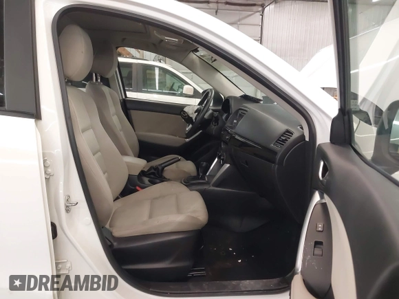 2014 Mazda CX-5 Touring with VIN JM3KE4CY4E0321055, listed as a IAAI auction lot 41613593 with 174,339 mi miles. Bid and sale history available at carsss.com. Image 5.