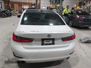 2019 BMW 3 Series 330i xDrive with VIN WBA5R7C55KAJ83482, listed as a IAAI auction lot 41565321 with 126,536 mi miles. Bid and sale history available at carsss.com. Image 16.