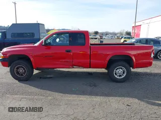 1999 Dodge Dakota SLT with VIN 1B7GG22XXXS290116, listed as a IAAI auction lot 41372636 with 132,112 mi miles and . Bid and sale history available at carsss.com. Image 14.