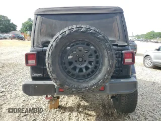 2019 Jeep Wrangler Unlimited Rubicon with VIN 1C4HJXFN2KW525606, listed as a Copart auction lot 62674225 with 55,128 mi miles and Salvage title. Bid and sale history available at DreamBid. Image 6.