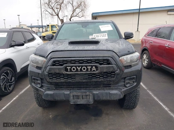 2019 Toyota Tacoma 4WD SR with VIN 5TFCZ5AN8KX205408, listed as a IAAI auction lot 41521901 with 63,387 mi miles. Bid and sale history available at carsss.com. Image 13.