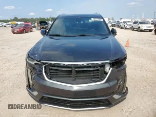 2022 Cadillac XT6 Premium Luxury z VIN 1GYKPCRS1NZ104567, wystawiony jako Copart lot #58211505 z przebiegiem 54 541 mil mil oraz Tytuł czysty. Historia ofert i sprzedaży dostępna na DreamBid. Obrazek 5.