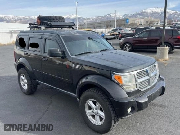 2008 Dodge Nitro SLT z VIN 1D8GU58K68W145253, wystawiony jako Copart lot #43768705 z przebiegiem 167 904 mil mil oraz Czysty tytuł • Clean title. Historia ofert i sprzedaży dostępna na DreamBid. Obrazek 1.