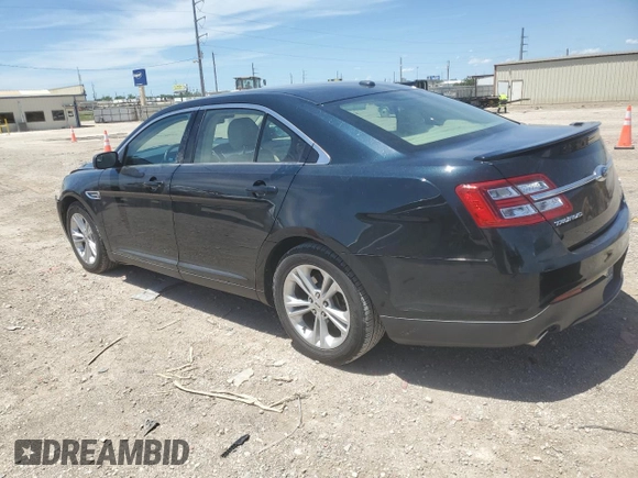 2014 Ford Taurus SEL z VIN 1FAHP2E81EG127398, wystawiony jako Copart lot #56666105 z przebiegiem 96 693 mil mil oraz Szkoda całkowita • Salvage title. Historia ofert i sprzedaży dostępna na DreamBid. Obrazek 2.