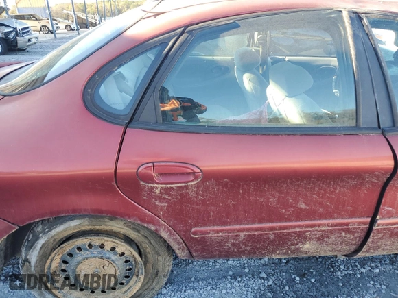 1998 Ford Taurus z VIN 1FAFP52S5WA261151, wystawiony jako Copart lot #83960754 z przebiegiem 135 049 mil mil oraz Szkoda całkowita • Salvage title. Historia ofert i sprzedaży dostępna na DreamBid. Obrazek 10.