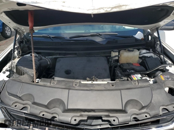 2021 Chevrolet Traverse LS with VIN 1GNERFKW8MJ138733, listed as a Copart auction lot 56684615 with 96,628 mi miles and Salvage title. Bid and sale history available at DreamBid. Image 12.