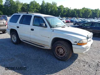 1999 Dodge Durango z VIN 1B4HS28Z7XF506442, wystawiony jako IAAI lot #42611396 z przebiegiem 200 467 mil mil oraz . Historia ofert i sprzedaży dostępna na DreamBid. Obrazek 1.