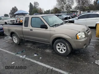 2004 Nissan Frontier XE with VIN 1N6DD26T14C406373, listed as a Copart auction lot 44242435 with 164,995 mi miles and Clean title. Bid and sale history available at DreamBid. Image 4.