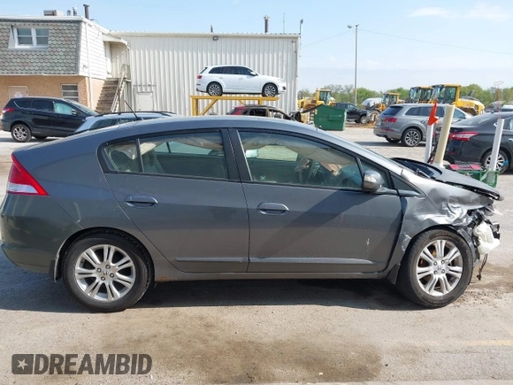 2011 Honda Insight EX with VIN JHMZE2H7XBS006254, listed as a IAAI auction lot 42222213 with 244,078 mi miles and . Bid and sale history available at DreamBid. Image 13.