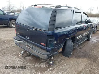 2004 GMC Yukon SLT with VIN 1GKEK13Z74R114583, listed as a IAAI auction lot 41834400 with 311,567 mi miles. Bid and sale history available at carsss.com. Image 4.
