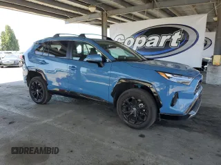 2022 Toyota RAV4 Hybrid SE with VIN 4T3T6RFV7NU103423, listed as a Copart auction lot 59709215 with 27,595 mi miles and Salvage title. Bid and sale history available at DreamBid. Image 4.