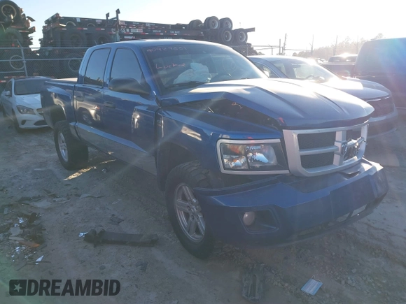 2010 Dodge Dakota Bighorn/Lonestar with VIN 1D7CW3GP5AS130870, listed as a IAAI auction lot 40929651 with 128,077 mi miles. Bid and sale history available at carsss.com. Image 1.