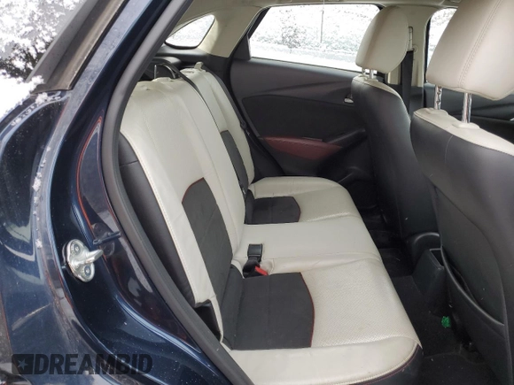2018 Mazda CX-3 Grand Touring z VIN JM1DKFD73J0309811, wystawiony jako Copart lot #50003315 z przebiegiem 135 365 mil mil oraz Czysty tytuł • Clean title. Historia ofert i sprzedaży dostępna na DreamBid. Obrazek 10.