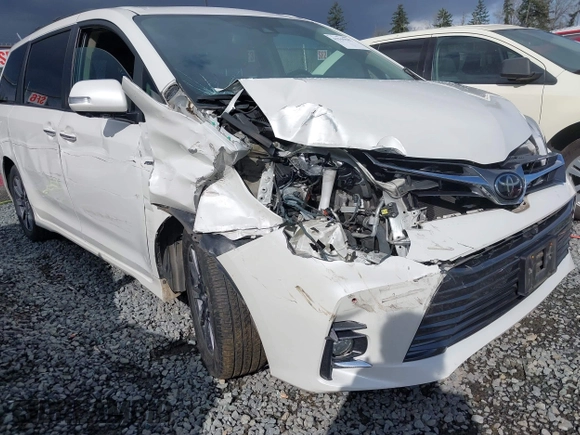 2018 Toyota Sienna XLE with VIN 5TDDZ3DC6JS199051, listed as a IAAI auction lot 41945587 with 58,818 mi miles and . Bid and sale history available at DreamBid. Image 6.