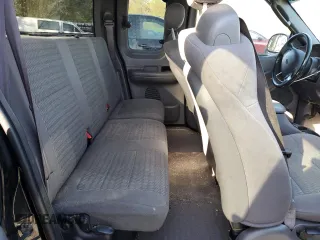 2002 Ford F-150 XL with VIN 1FTRX17L42NB06983, listed as a Copart auction lot 54172855 with 150,243 mi miles and Salvage title. Bid and sale history available at DreamBid. Image 10.