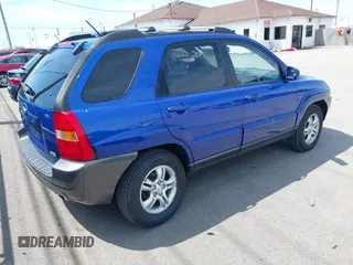 2006 Kia Sportage LX with VIN KNDJF723167214580, listed as a IAAI auction lot 42126184 with 125,434 mi miles and . Bid and sale history available at carsss.com. Image 4.
