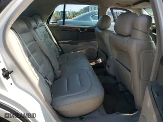 2001 Cadillac DeVille with VIN 1G6KD54YX1U158322, listed as a Copart auction lot 71097694 with 64,731 mi miles and Clean Title. Bid and sale history available at carsss.com. Image 10.