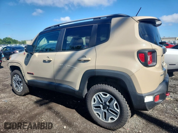2015 Jeep Renegade Trailhawk with VIN ZACCJBCT0FPB59921, listed as a Copart auction lot 64270935 with 84,906 mi miles and Salvage title. Bid and sale history available at DreamBid. Image 2.