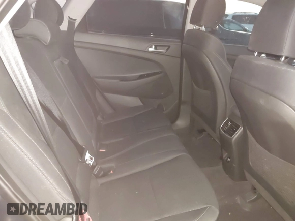2019 Hyundai Tucson Sport with VIN KM8J33AL7KU901296, listed as a IAAI auction lot 41132884 with 76,948 mi miles. Bid and sale history available at carsss.com. Image 8.