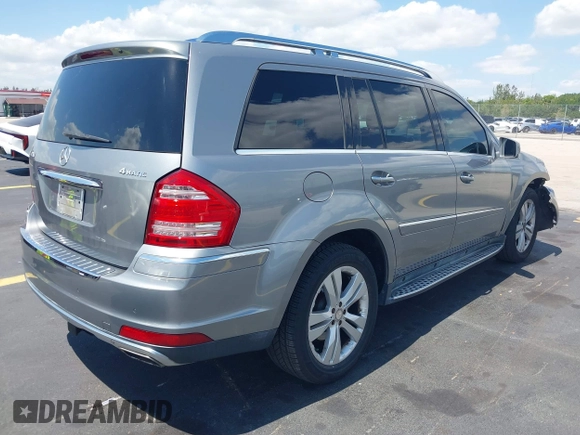 2012 Mercedes-Benz GL 450 z VIN 4JGBF7BE1CA800793, wystawiony jako IAAI lot #42312472 z przebiegiem 155 847 mil mil oraz . Historia ofert i sprzedaży dostępna na DreamBid. Obrazek 4.