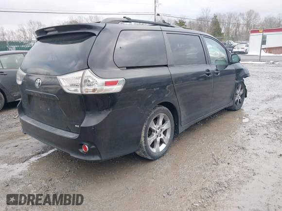 2012 Toyota Sienna SE with VIN 5TDXK3DC4CS187677, listed as a IAAI auction lot 41553292 with 145,282 mi miles. Bid and sale history available at carsss.com. Image 4.