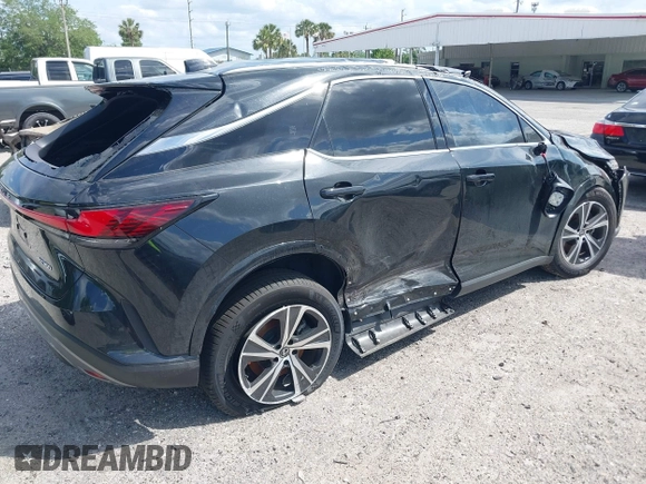 2023 Lexus RX with VIN JTJCHMAAXP2001561, listed as a IAAI auction lot 40850514 with 1 mi miles. Bid and sale history available at carsss.com. Image 4.