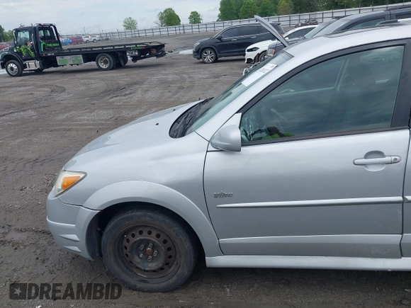 2007 Pontiac Vibe with VIN 5Y2SL658X7Z411431, listed as a IAAI auction lot 42181112 with 167,246 mi miles. Bid and sale history available at carsss.com. Image 14.