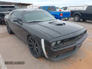 2014 Dodge Challenger R/T z VIN 2C3CDYBT9EH281990, wystawiony jako IAAI lot #42265921 z przebiegiem 173 185 mil mil oraz . Historia ofert i sprzedaży dostępna na DreamBid. Obrazek 1.