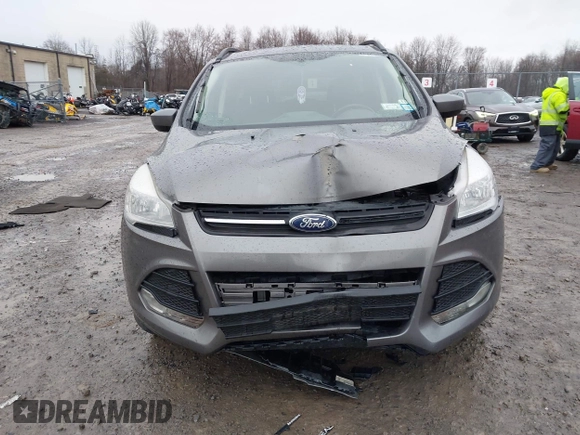 2014 Ford Escape SE with VIN 1FMCU9GX3EUB91417, listed as a IAAI auction lot 42009257 with 87,164 mi miles and . Bid and sale history available at DreamBid. Image 6.
