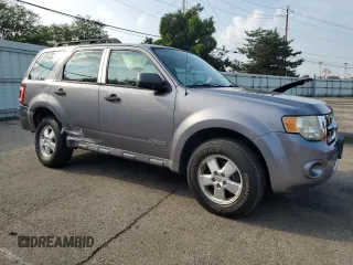 2008 Ford Escape XLS with VIN 1FMCU02Z38KA28478, listed as a Copart auction lot 62279955 with 166,124 mi miles and Salvage title. Bid and sale history available at DreamBid. Image 4.