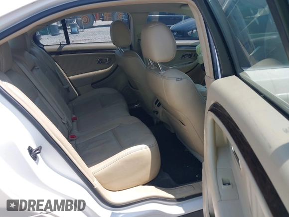 2015 Ford Taurus Limited with VIN 1FAHP2F88FG171835, listed as a IAAI auction lot 42370656 with 152,210 mi miles and . Bid and sale history available at DreamBid. Image 8.