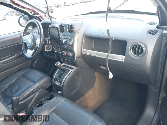 2017 Jeep Compass Latitude with VIN 1C4NJDEB6HD137257, listed as a IAAI auction lot 40720719 with 88,701 mi miles and . Bid and sale history available at DreamBid. Image 5.