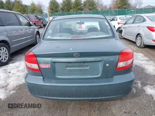 2003 Kia Rio with VIN KNADC125336231562, listed as a IAAI auction lot 41386659 with 87,965 mi miles. Bid and sale history available at carsss.com. Image 16.
