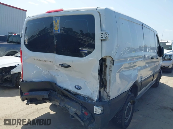 2018 Ford Transit with VIN 1FTYE1ZM0JKA43498, listed as a IAAI auction lot 42514847 with 131,539 mi miles and . Bid and sale history available at DreamBid. Image 4.