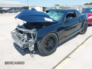 2014 Chevrolet Camaro LS z VIN 2G1FA1E32E9126043, wystawiony jako IAAI lot #42253189 z przebiegiem 104 457 mil mil oraz . Historia ofert i sprzedaży dostępna na DreamBid. Obrazek 2.