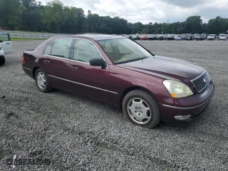 2002 Lexus LS 430 with VIN JTHBN30F720076834, listed as a Copart auction lot 61637384 with 129,217 mi miles and Salvage Title. Bid and sale history available at carsss.com. Image 4.