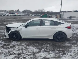 2023 Honda Civic Sport z VIN 19XFL2H89PE008381, wystawiony jako IAAI lot #41443683 z przebiegiem Nie podano mil oraz . Historia ofert i sprzedaży dostępna na DreamBid. Obrazek 14.