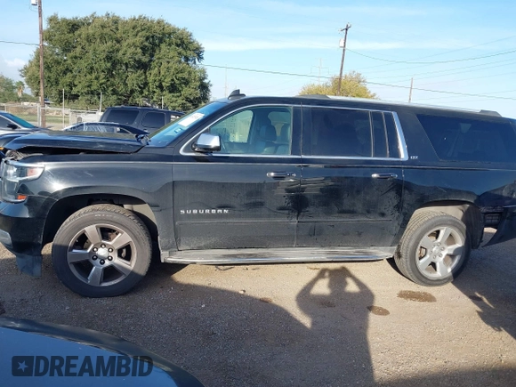 2016 Chevrolet Suburban LTZ with VIN 1GNSCJKC9GR212874, listed as a IAAI auction lot 41125926 with 82,714 mi miles and . Bid and sale history available at DreamBid. Image 14.