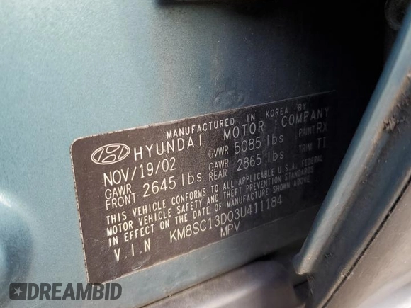 2003 Hyundai Santa Fe GLS with VIN KM8SC13D03U411184, listed as a Copart auction lot 46937505 with 185,227 mi miles and Salvage Title. Bid and sale history available at carsss.com. Image 12.