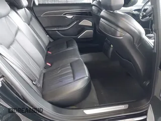 2019 Audi A8 L with VIN WAU8DAF8XKN013139, listed as a IAAI auction lot 41662195 with 38,442 mi miles. Bid and sale history available at carsss.com. Image 8.