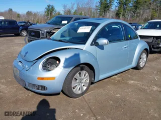 2010 Volkswagen New Beetle Coupe with VIN 3VWRG3AG4AM022921, listed as a IAAI auction lot 42048260 with 75,900 mi miles. Bid and sale history available at carsss.com. Image 2.