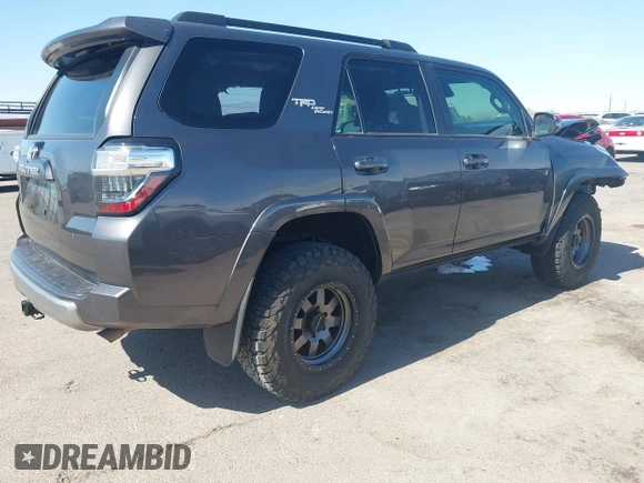 2021 Toyota 4Runner TRD Off Road Premium with VIN JTERU5JR3M5879360, listed as a IAAI auction lot 42338868 with 54,742 mi miles and . Bid and sale history available at DreamBid. Image 4.