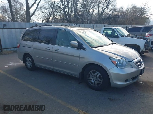 2005 Honda Odyssey EX-L with VIN 5FNRL38615B062427, listed as a IAAI auction lot 41922322 with 194,837 mi miles. Bid and sale history available at carsss.com. Image 1.