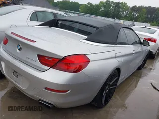 2012 BMW 6 Series 650i with VIN WBALZ3C5XCDL71723, listed as a IAAI auction lot 42204721 with 132,912 mi miles and . Bid and sale history available at carsss.com. Image 4.