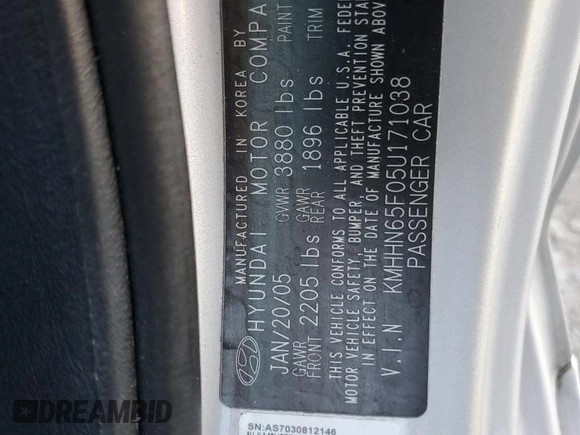 2005 Hyundai Tiburon GT z VIN KMHHN65F05U171038, wystawiony jako Copart lot #87765735 z przebiegiem 113 129 mil mil oraz Szkoda całkowita • Salvage title. Historia ofert i sprzedaży dostępna na DreamBid. Obrazek 14.