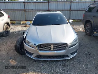2017 Lincoln MKZ Select z VIN 3LN6L5D96HR663197, wystawiony jako IAAI lot #42280513 z przebiegiem 76 578 mil mil oraz . Historia ofert i sprzedaży dostępna na DreamBid. Obrazek 13.