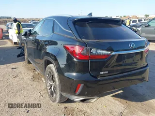 2016 Lexus RX 350 with VIN 2T2BZMCAXGC047428, listed as a IAAI auction lot 41992254 with 233,391 mi miles and . Bid and sale history available at DreamBid. Image 3.
