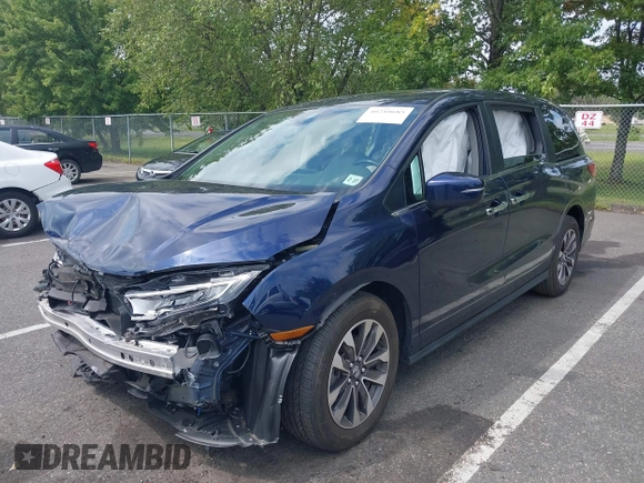 2022 Honda Odyssey EX-L with VIN 5FNRL6H70NB053843, listed as a IAAI auction lot 40210685 with 21,571 mi miles and . Bid and sale history available at DreamBid. Image 2.