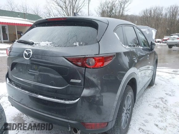 2019 Mazda CX-5 Touring with VIN JM3KFBCM7K0583582, listed as a IAAI auction lot 41634349 with 33,709 mi miles. Bid and sale history available at carsss.com. Image 12.